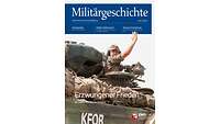 Kommandant eines Schützenpanzers der KFOR gibt mit erhobener Hand das Zeichen zur Abfahrt weiter. 