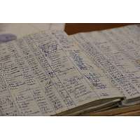 linierte Seiten mit handschriftlichen Eintragungen in 7 Spalten