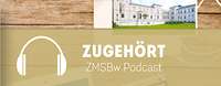 zwei Männder lächeln in die Kamera